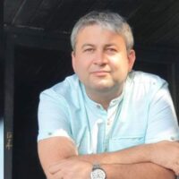 Metafora gospodăriei: ce ascunde discursul austerității lui Bolojan