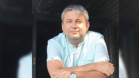 Metafora gospodăriei: ce ascunde discursul austerității lui Bolojan
